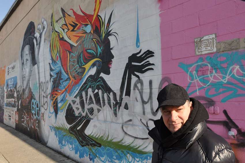 Priest ministers to street artists who are transforming neighbourhood
