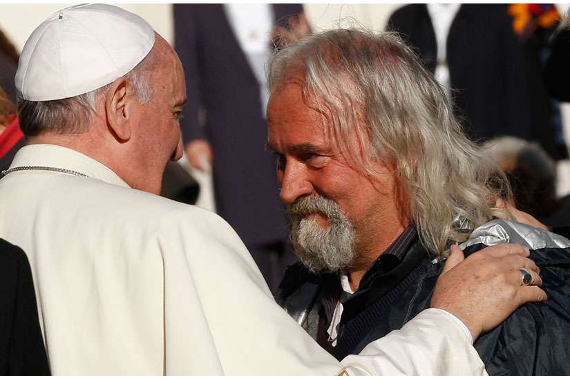 First showers, now sleeping bags: Pope Francis’ birthday gift to the homeless