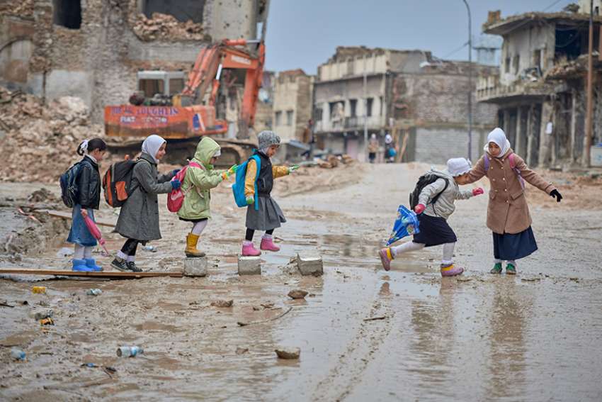 Iraqi priest rebuilds church in war-torn Mosul, hopes returning Christians will follow