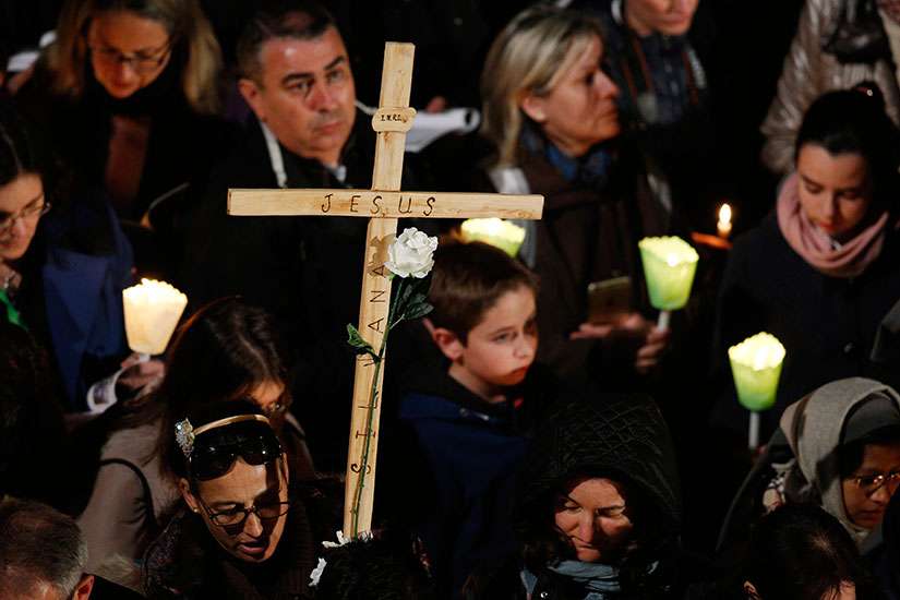 Pope Francis reads prayer, “O Cross of Christ," during Good Friday service