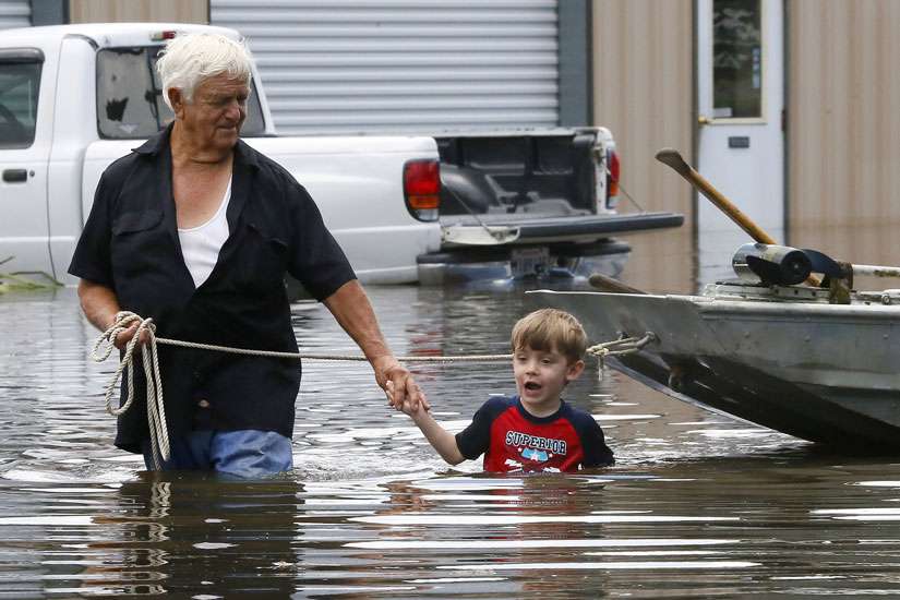 Louisiana bishop comforts evacuees at shelters; flooding displaces 20,000