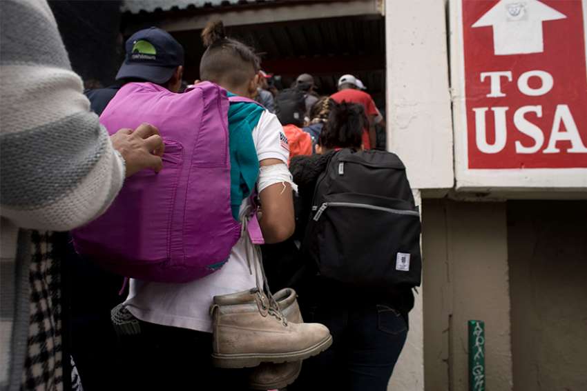 Few at Mexico-U.S. border will have asylum claims accepted, priest says