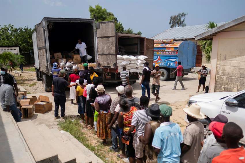 Post-quake Haiti: Funerals and a daily quest for food, water, shelter