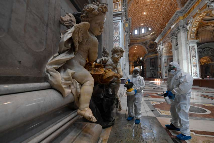 Vatican workers sanitize St. Peter's Basilica