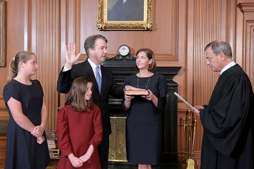 Amid shouts of protesters in gallery, U.S. Senate votes 48-50 to confirm Kavanaugh to Supreme Court
