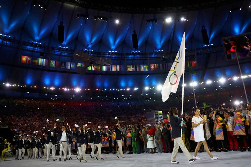 Pope praises witness of 10 athletes on Refugee Olympic Team