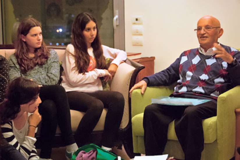 Meeting with Holocaust survivors in living rooms