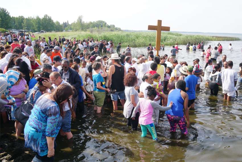 Pilgrims find healing, renewal in the waters of Alberta's Lac Ste. Anne