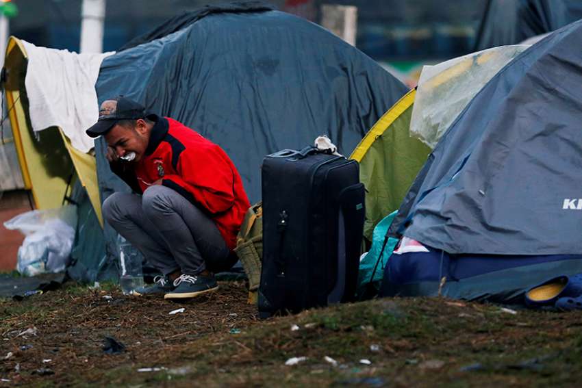 With migration, cooperation is better than isolationism, Cardinal Parolin says