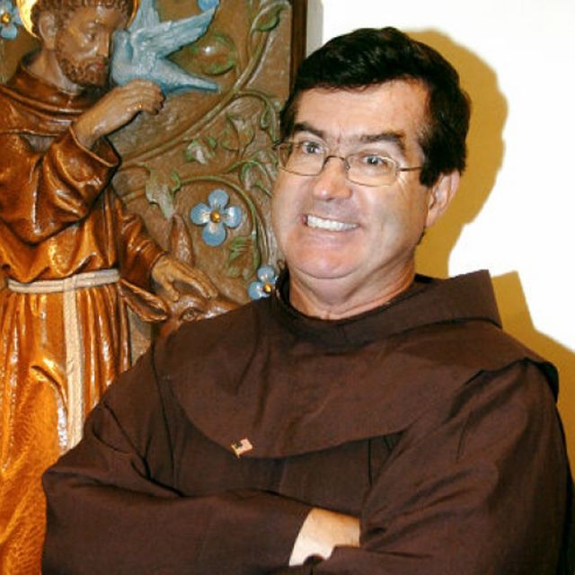 Priest on sidelines at marathon says he tried to bring calm to chaos 