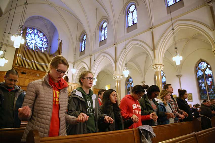 U.S. Catholic school students join peers in march against gun violence