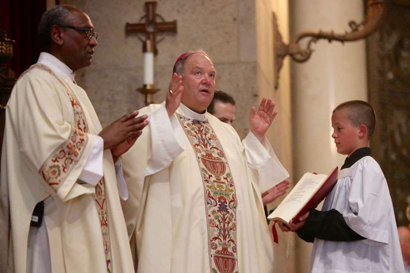 Pray for healing of community divisions, archbishop says in response to police shooting death