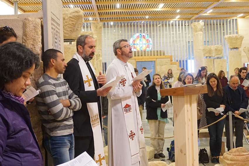 Atop Mount Nebo, Christians pray for those in Mideast facing violence