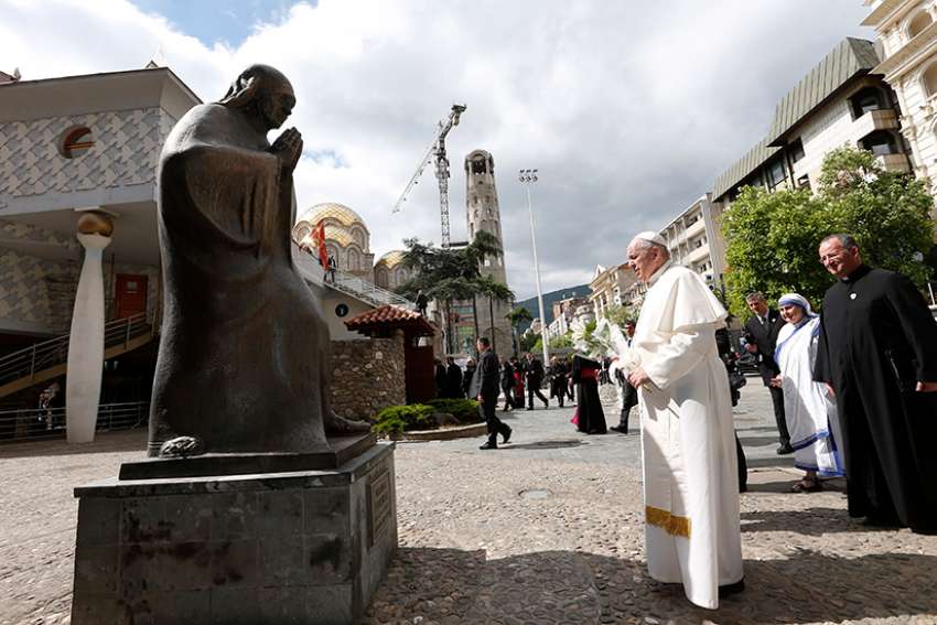 Pope draws lessons from Mother Teresa in city of her birth