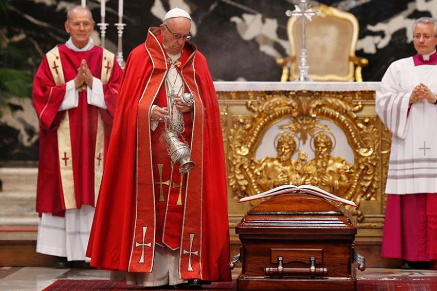 Pope Francis attends funeral of cardinal who announced to world his election