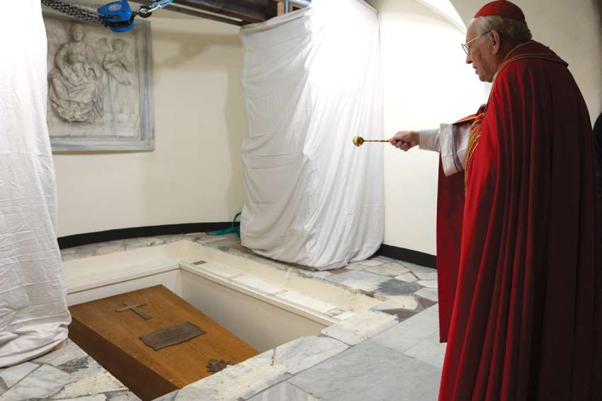 Late pope laid to rest in saints’ spot