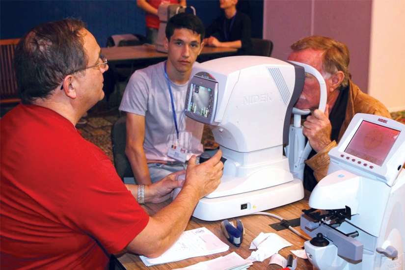 Priest awarded Meritorious Service Medal for bringing eyecare to developing nations