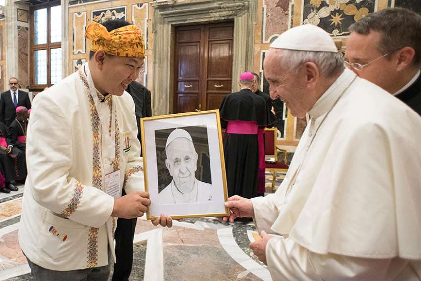 Those exploiting foreigners for profit will pay on Judgment Day, Pope says