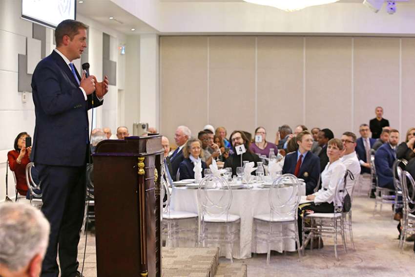 Andrew Scheer vows to end funding attestation with Conservative government