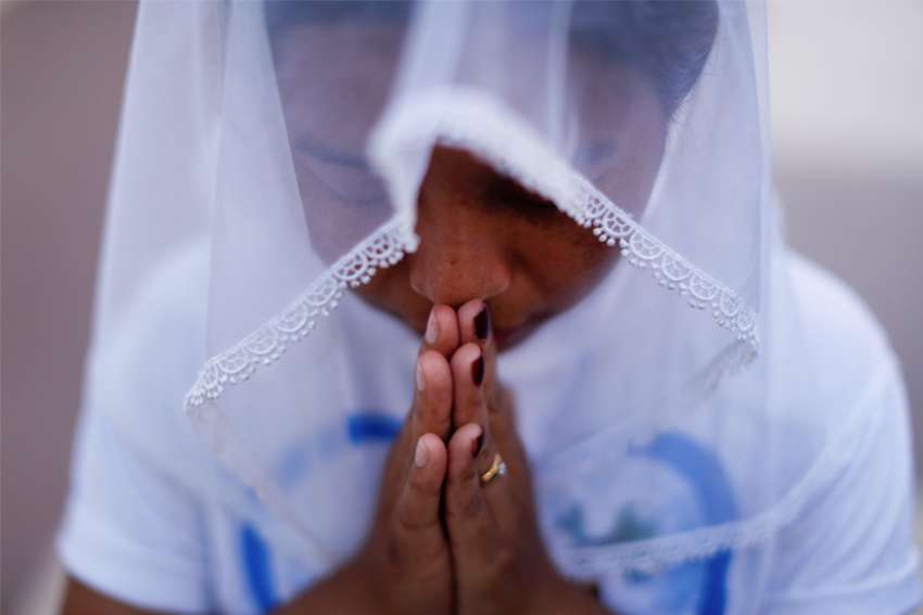 Catholics hold funeral after Myanmar massacre; attacks continue