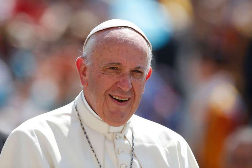 Pope Francis treats homeless to pizza and swim at the beach