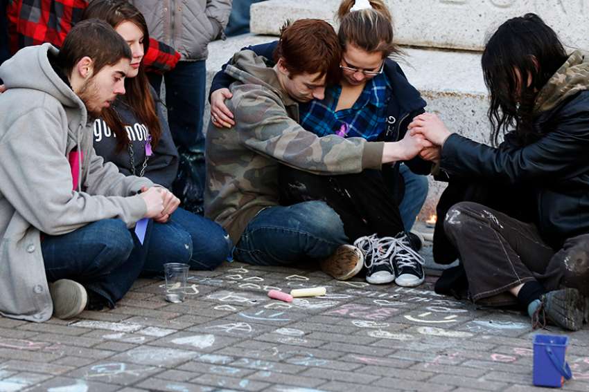 Priest apologizes for funeral homily that focused on teen's suicide