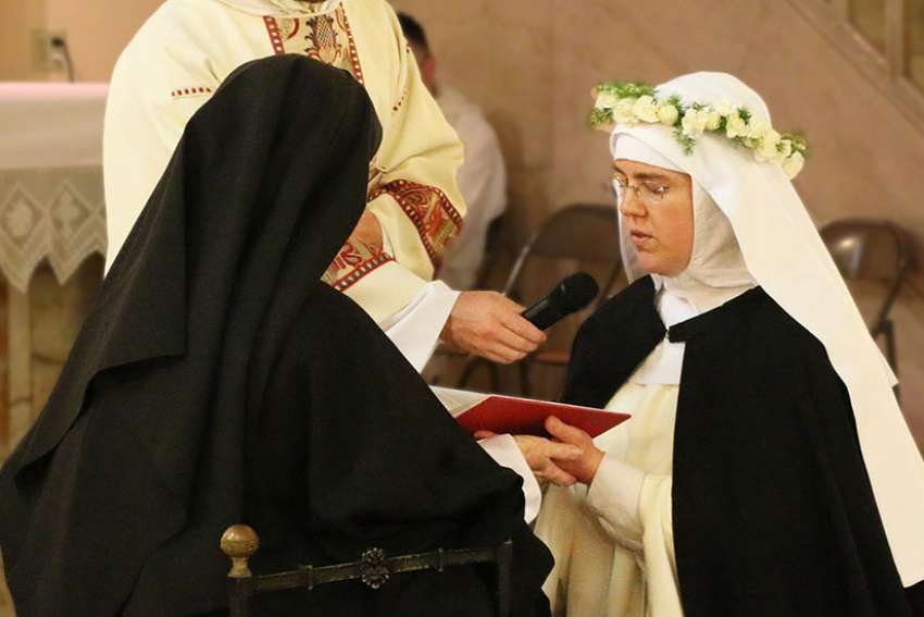 Former attorney professes first vows as cloistered Dominican nun