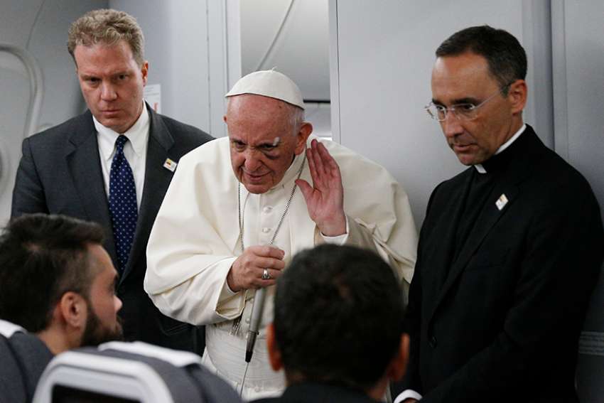 Journalists' voices are needed for the growth of a democratic society, Pope says