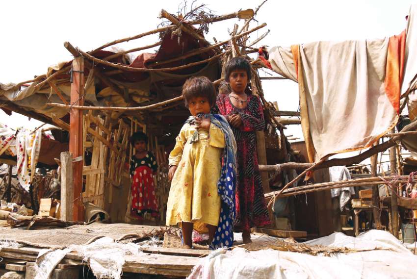Global poverty rates are falling, but it's not all good news, reports say