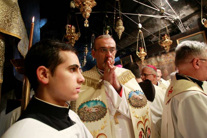Christ's birth invites new thinking in troubled world, Latin patriarch says on Christmas Eve