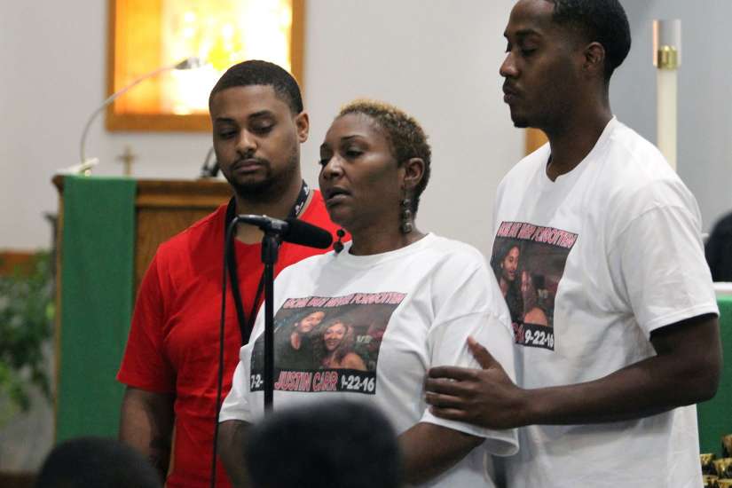 Charlotte parishioners gather for prayer service, mourn protester's death