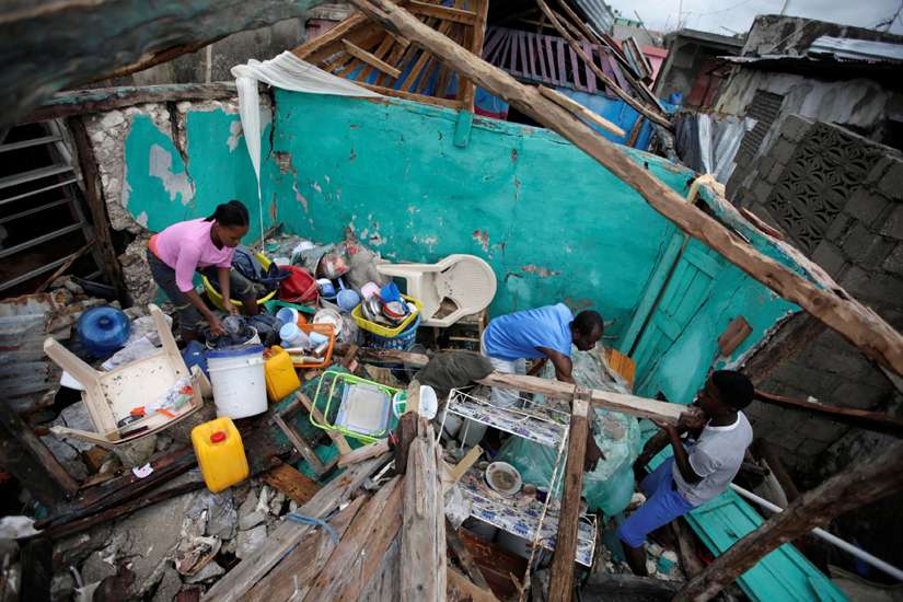 Hurricane response in Haiti slowed by blocked roads, floods, power outages