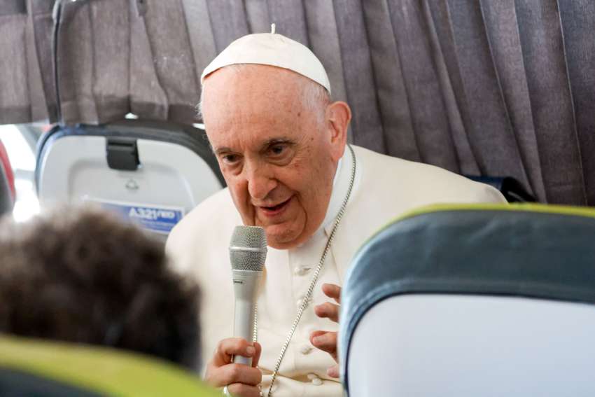 On flight to Rome, Pope Francis responds to questions about abuse, his health