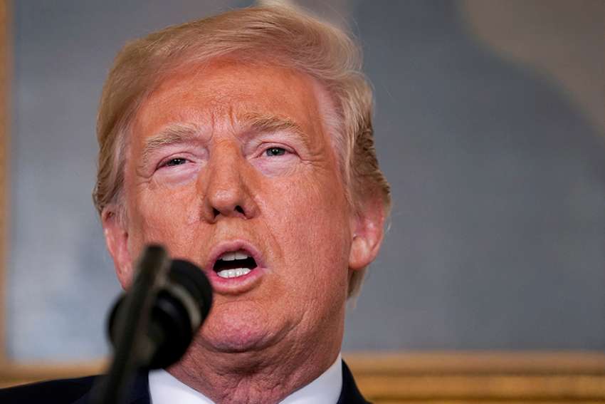 Court upholds travel ban, says directive is within president's power