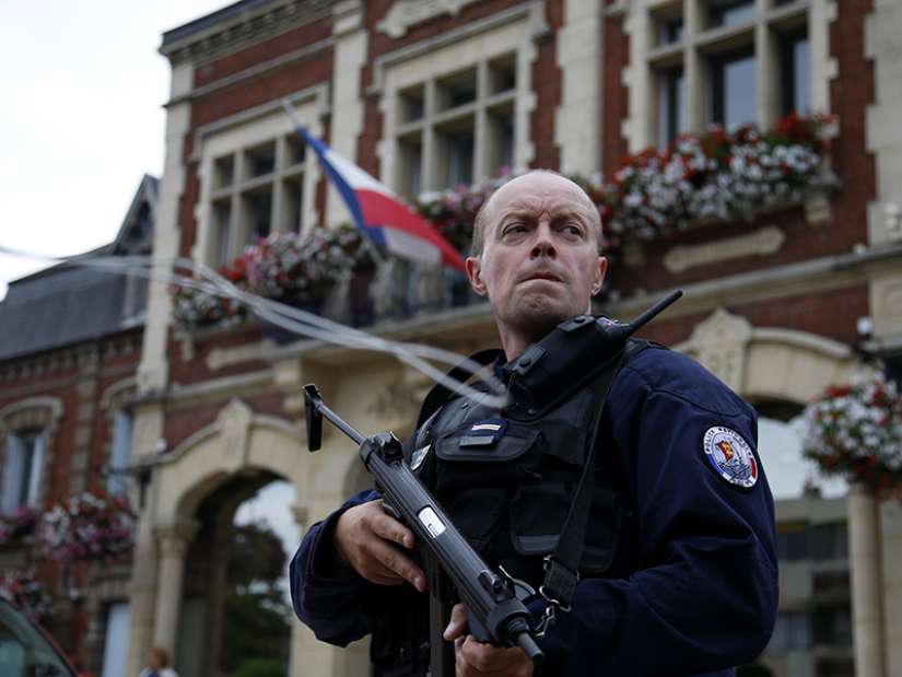 Priest slain in France while saying Mass; ISIS claims attack