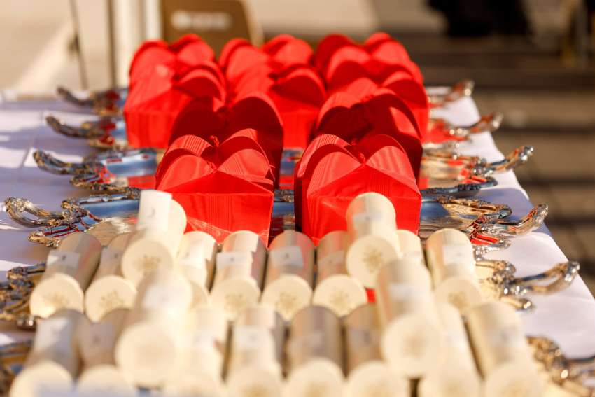 Hundreds stand in line to greet new cardinals from the 'peripheries'