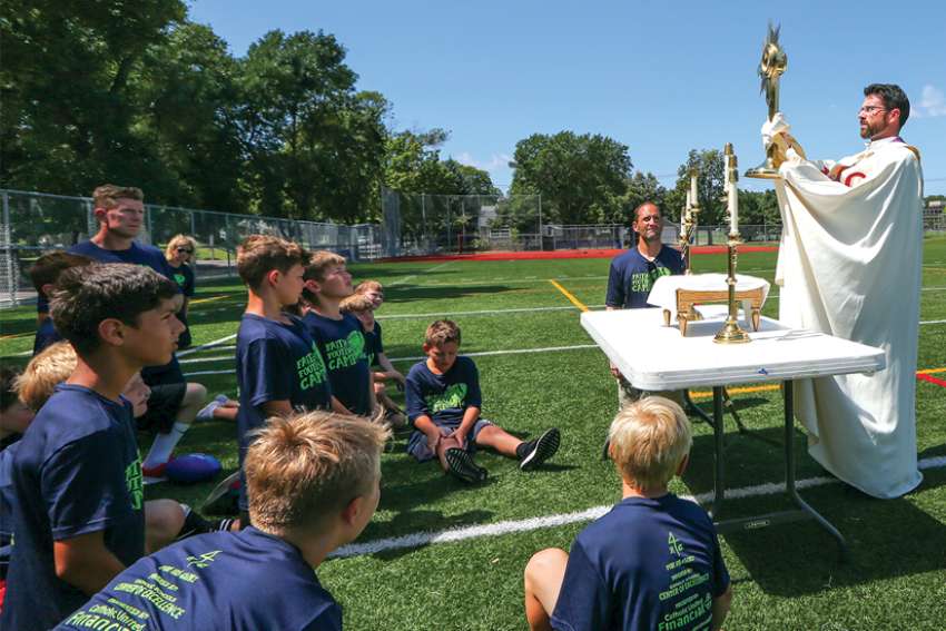 Camp puts Jesus on gridiron