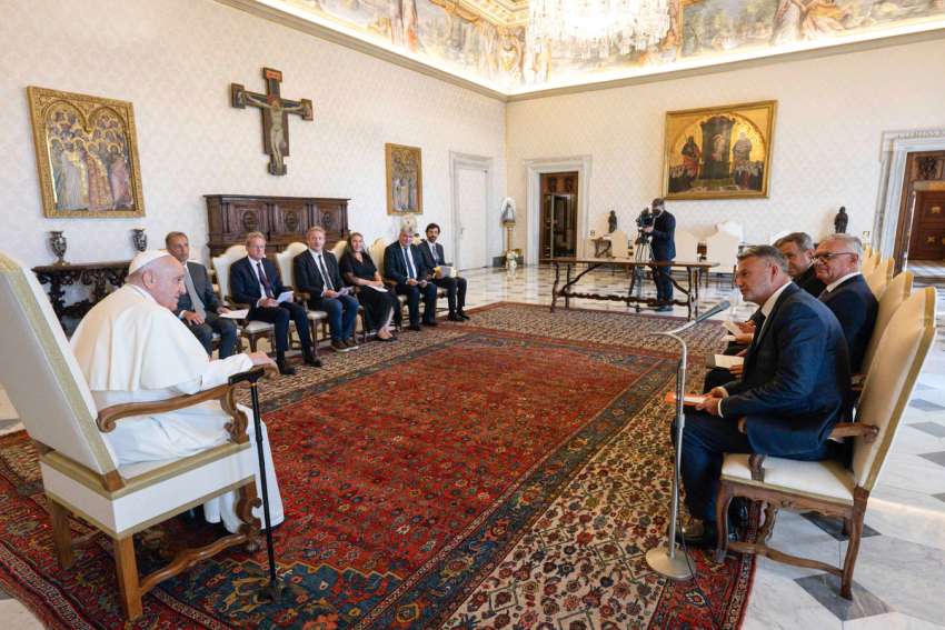 Pope Francis tells lawyers he's writing a new document on the environment