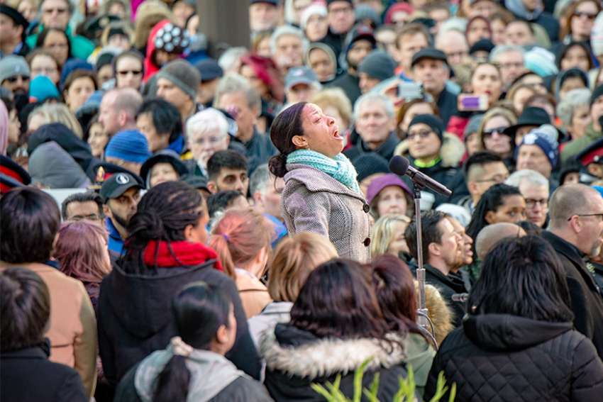 Vigil unites a city grieving victims of Toronto van attack